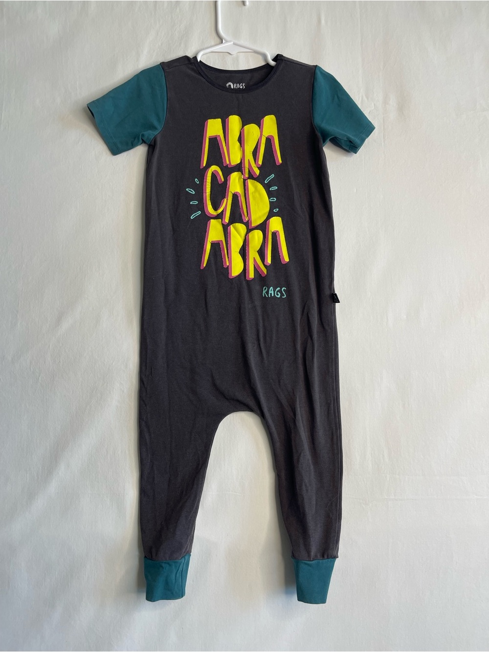 Rags‎ to Raches Black One-Piece Bodysuit with Teal Sleeves and Yellow Graphic